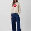 100 % bomullsgenser med «Kiss»-raglan