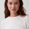 100 % bomullsgenser med rullekrage