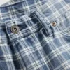 90-talls-inspirerte, løse denimshorts med rutemønster