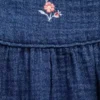 Baby-body i bomullsgasbind og denim