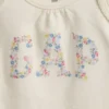 Baby-body i økologisk bomull med blomsterlogo
