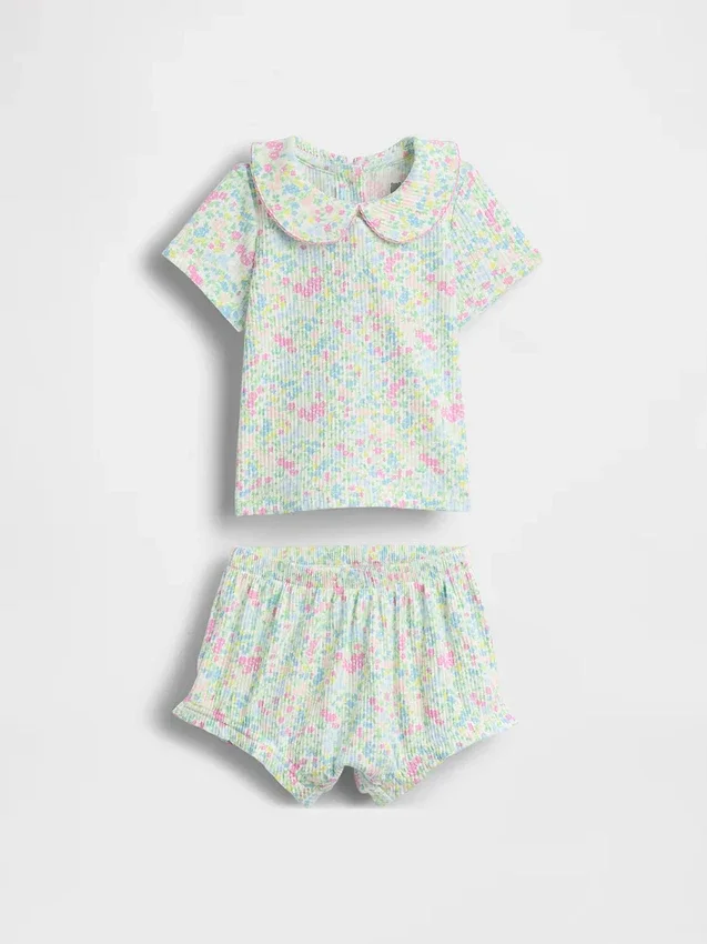 Baby-body med Peter Pan-krage i tinyrib