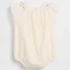 Baby-body med smock og blomstermønster