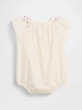 Baby-body med smock og blomstermønster