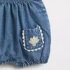 Baby-overalls i denim med lommer