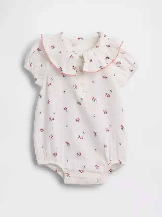Babybody i bomullsgasbind med blomstermønster og krage