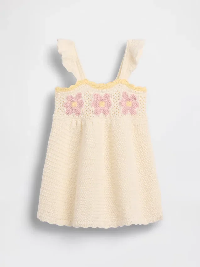 Babykjole med heklede blomster