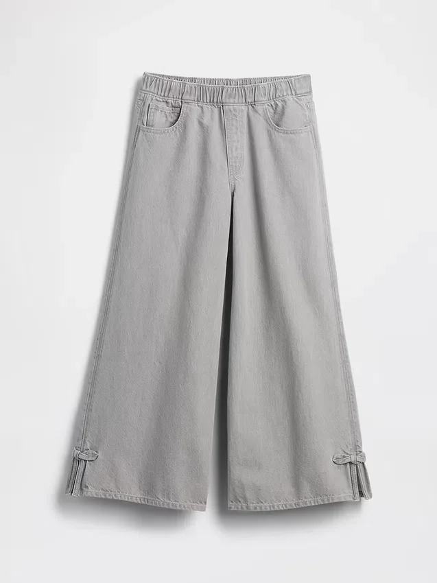 Baggy-Jeans for barn med lav midje, sløyfe og splittet kant