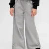 Baggy-Jeans for barn med lav midje, sløyfe og splittet kant