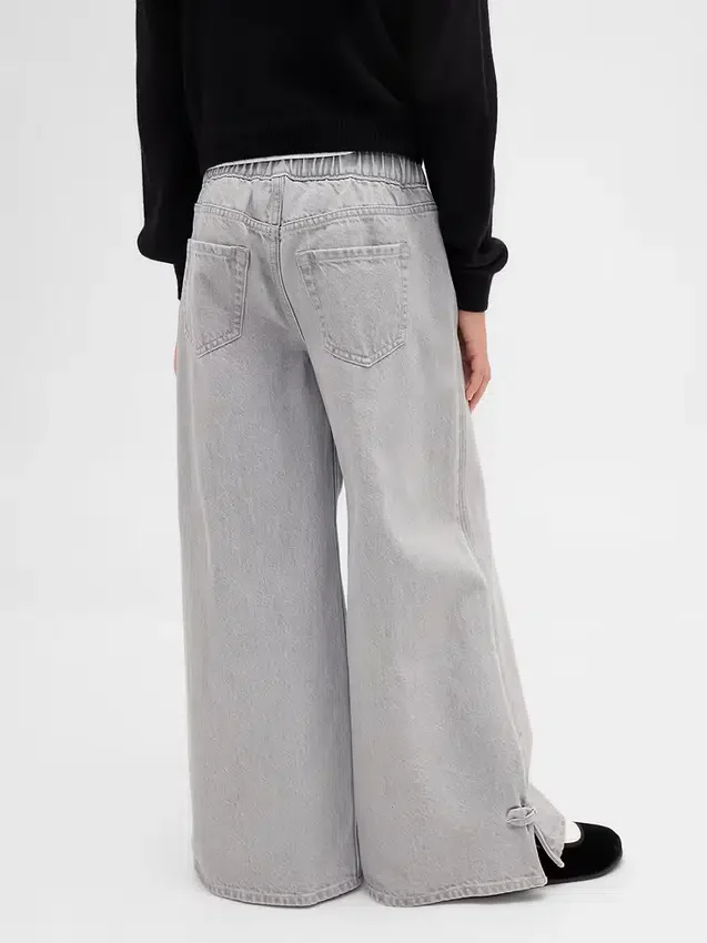 Baggy-Jeans for barn med lav midje, sløyfe og splittet kant