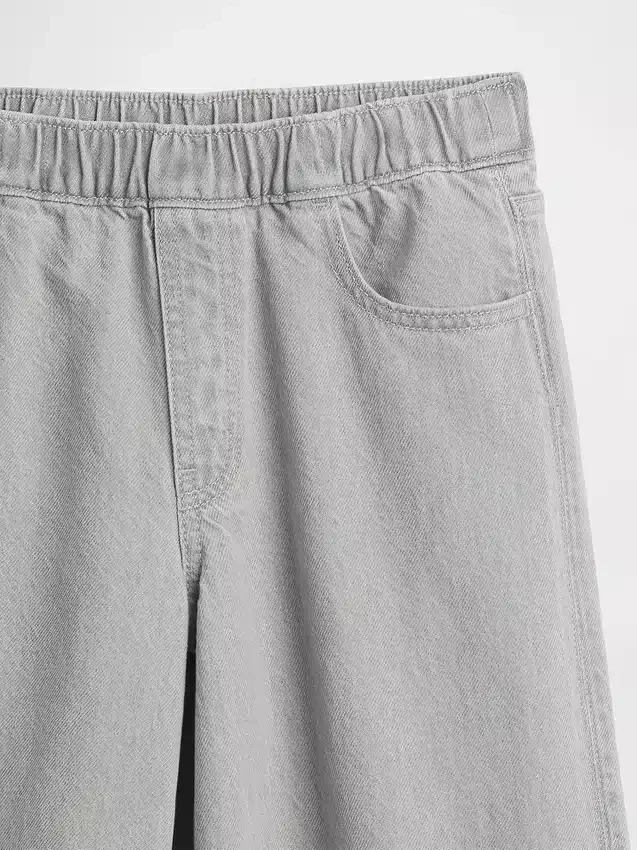 Baggy-Jeans for barn med lav midje, sløyfe og splittet kant