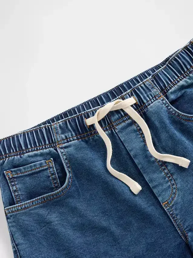 Baggy-Jeans i strikket denim med middels høy midje