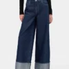Baggy-jeans med middels høy midje og metalliske mansjetter