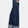 Baggy-jeans med middels høy midje og metalliske mansjetter