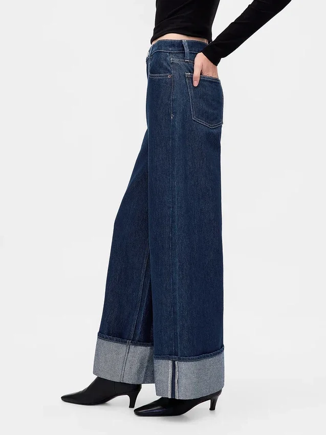 Baggy-jeans med middels høy midje og metalliske mansjetter