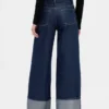 Baggy-jeans med middels høy midje og metalliske mansjetter