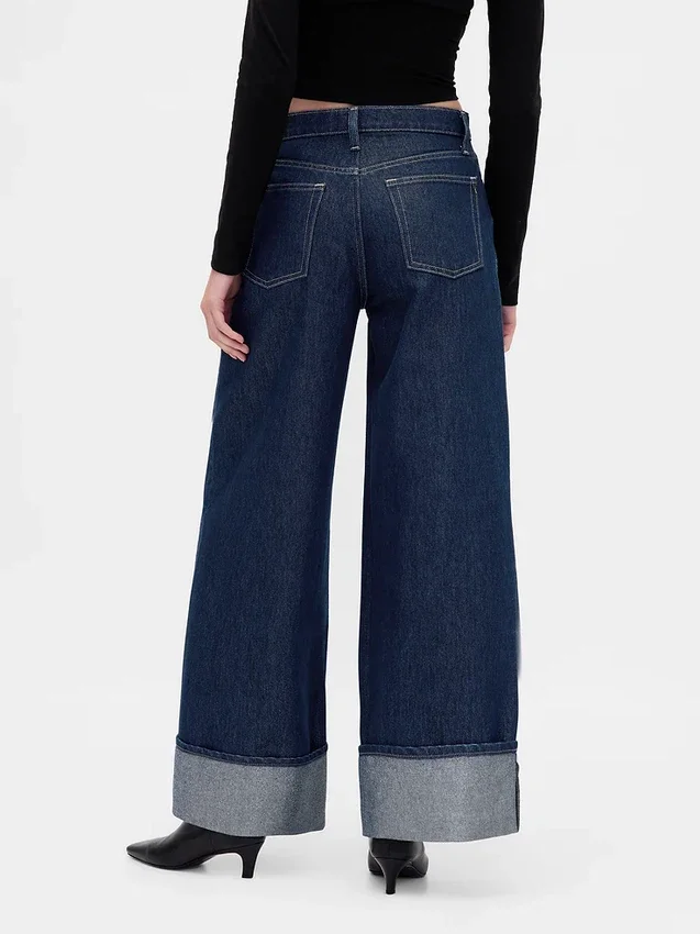 Baggy-jeans med middels høy midje og metalliske mansjetter