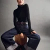 Baggy-jeans med middels høy midje og metalliske mansjetter