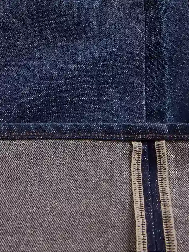 Baggy-jeans med middels høy midje og metalliske mansjetter