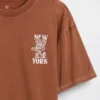 Barnes T-skjorte med grafisk trykk i avslappet passform