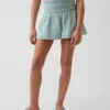 Barneshorts i bomullsgas med sommerfuglkant