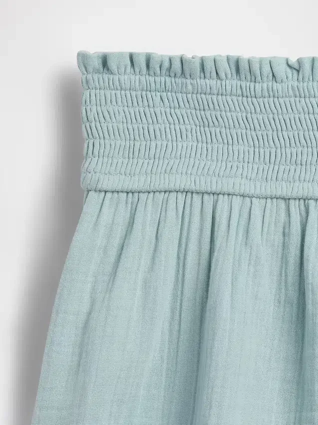 Barneshorts i bomullsgas med sommerfuglkant