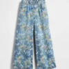 Barnesjeans med blomstermønster og løs passform