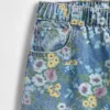 Barnesjeans med blomstermønster og løs passform