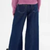Barnesjeans med lav midje, løs passform og metallisk glans