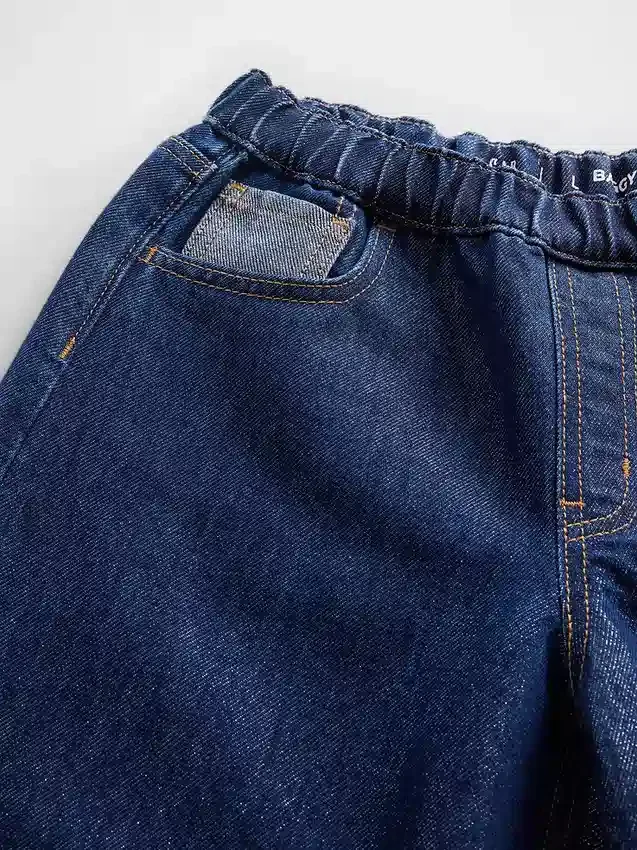 Barnesjeans med lav midje, løs passform og metallisk glans