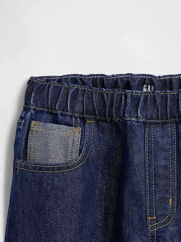 Barnesjeans med lav midje, løs passform og metallisk glans