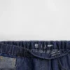 Barnesjeans med lav midje, løs passform og metallisk glans