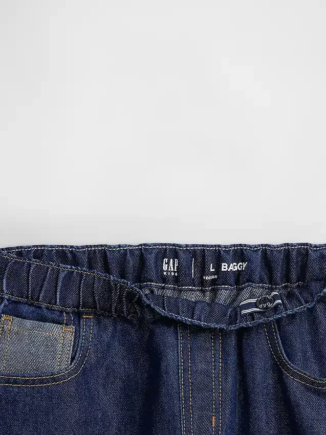 Barnesjeans med lav midje, løs passform og metallisk glans