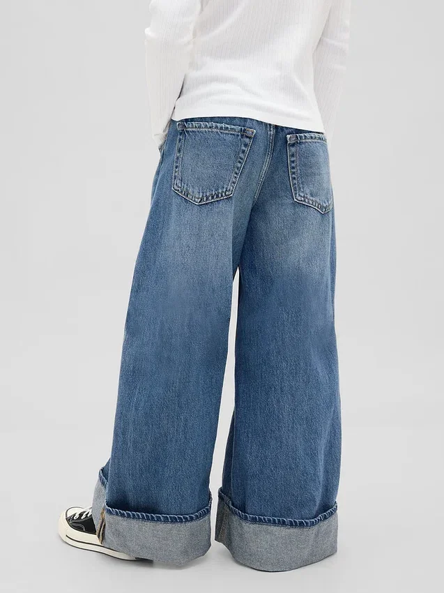 Barnesjeans med lav midje, vid ben og løs passform