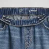 Barnesjeans med lav midje, vid ben og løs passform