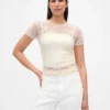 Blomstret topp i blonder og mesh