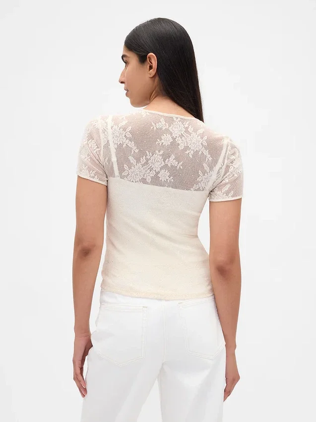 Blomstret topp i blonder og mesh