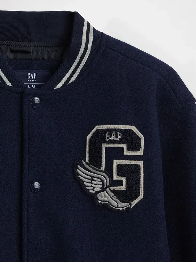 Bomberjakke med «Varsity»-logo for barn