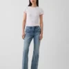 Capri-jeans med lav midje, lang og slank passform og påsydde lommer