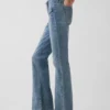 Capri-jeans med lav midje, lang og slank passform og påsydde lommer