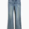 Capri-jeans med lav midje, lang og slank passform og påsydde lommer