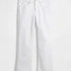 Crop-jeans med lav midje, lang og slank passform