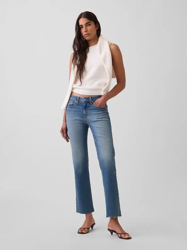 Crop-jeans med lav midje, lang og slank passform