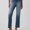 Crop-jeans med lav midje, lang og slank passform
