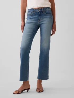 Crop-jeans med lav midje, lang og slank passform