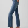 Crop-jeans med lav midje, lang og slank passform
