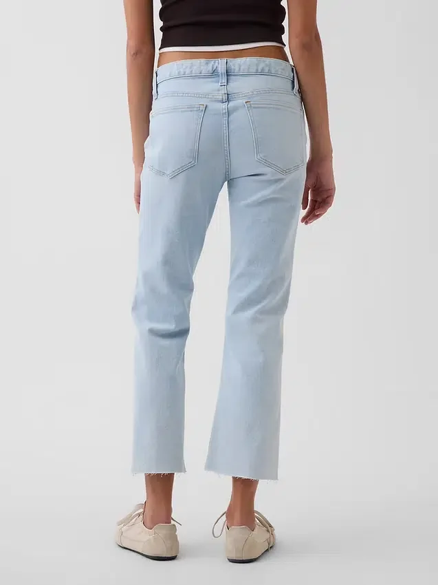 Crop-jeans med lav midje, lang og slank passform