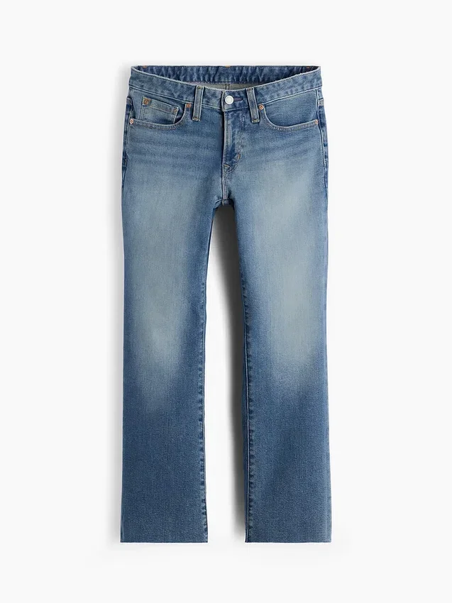 Crop-jeans med lav midje, lang og slank passform