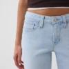 Crop-jeans med lav midje, lang og slank passform