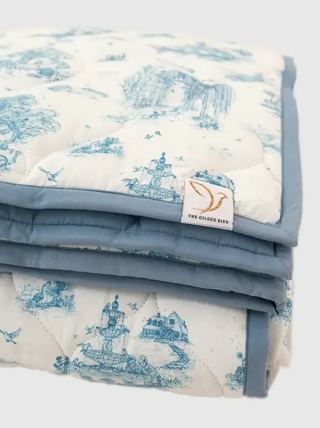 Det forgyllede fugle-leketeppet «Spring Toile»